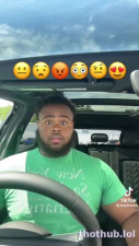 big buff black man in car